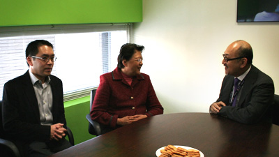 Mrs. Rita Fan (center), Mr. Kit Szeto (right) and Mr. David Pong (left) exchanging pleasantries.