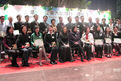 Representatives of the award-winning organizations and award presenters posing for the cameras after the ceremony.