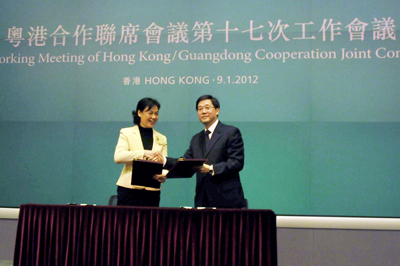Mr. Stephen Lam and Ms. Zhao Yufang signing the 2012 Work Plan of the Framework Agreement on Hong Kong/Guangdong Cooperation.