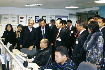 Members of the delegation inside Dim Sum TV’s Department of Channel Identity.