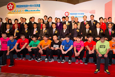 The guests of honour include Mr. Donald Tsang, Chief Executive of the HKSAR (seated, second row, 5th from right), and Mr. Li Gang, Deputy Director of the Liaison Office of the Central People’s Government in the HKSAR (seated, second row, 6th from right). In the front row are students from CMA Secondary School, the event’s guest performers.