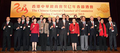 The guests of honour raising a toast to future prosperity.