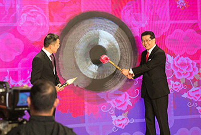 Mr. Gregory So Kam Leung sounded the electronic gong to get the festivities under way.