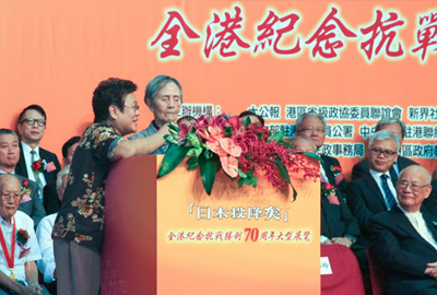 Old warrior Chao Xiangling singing the marching song of her old guerilla unit.