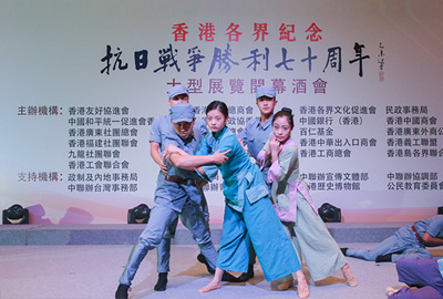 Members of the People’s Liberation Army Hong Kong Garrison performing a dance entitled The Fire In Hell.