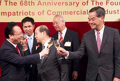 Mr. Leung Chun Ying, Vice chairman of the CPPCC National Committee (right) toasting with other officiating guests